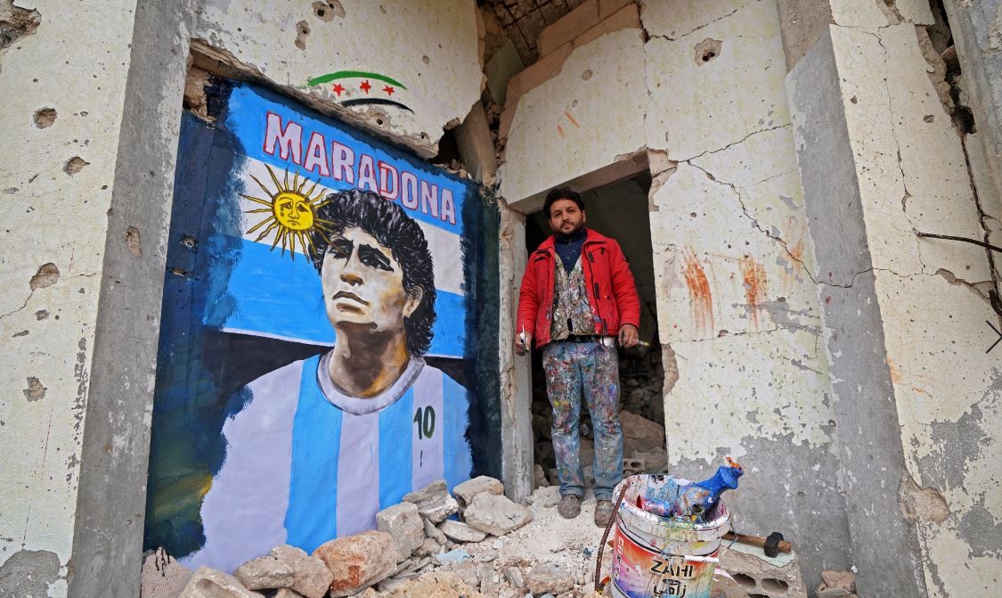 El mural homenaje que pintó un sirio en medio de las ruinas | Internacionales