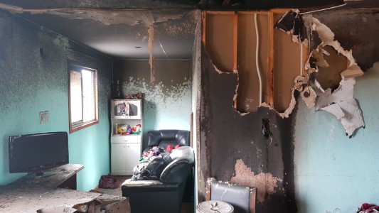 Incendio en barrio General Savio: Una mujer y sus dos hijos fueron rescatadas de milagro