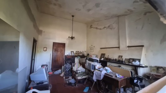 Imputaron a la mujer de 65 años que vivía con los cadáveres de sus hermanos en barrio Argüello Norte