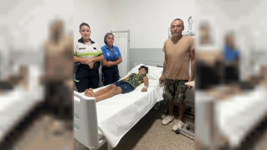 Una oficial rescató a un hombre y a su hijo en el río