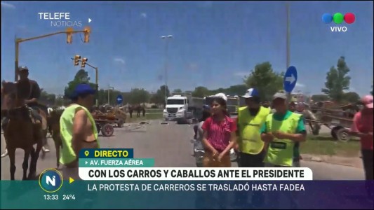 Con los carros y caballos ante el Presidente