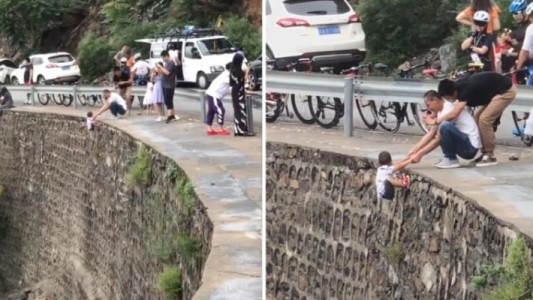 Impactante: colgaron a un nene de un precipicio para sacarle una "foto perfecta"
