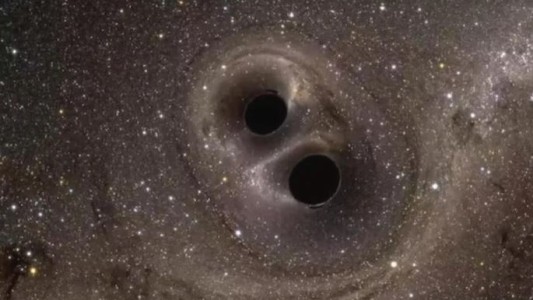 Astrónomos indicaron que dos agujeros negros están próximos a chocar