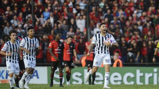 Talleres perdía y rescató un empate ante Colón con un doblete de Nahuel Bustos